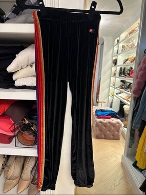 Aviator Nation Black Velvet Track Pants with Rainbow Side Stripes